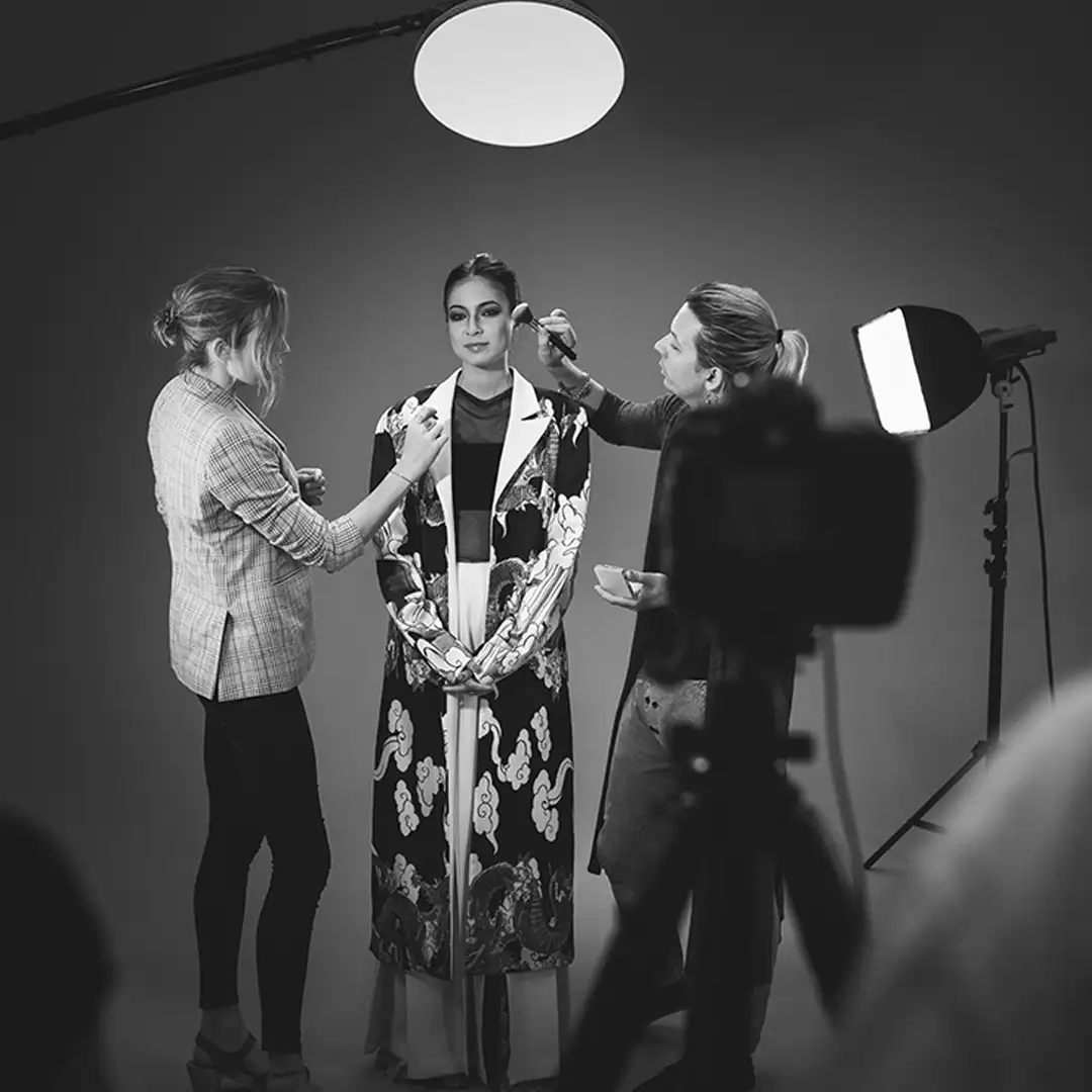 Performers and crew on a short-form production set